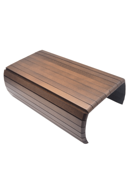 Nakładka łamana na bok meblowy, w kolorze orzecha, pokazująca jej ułożenie na boku mebla